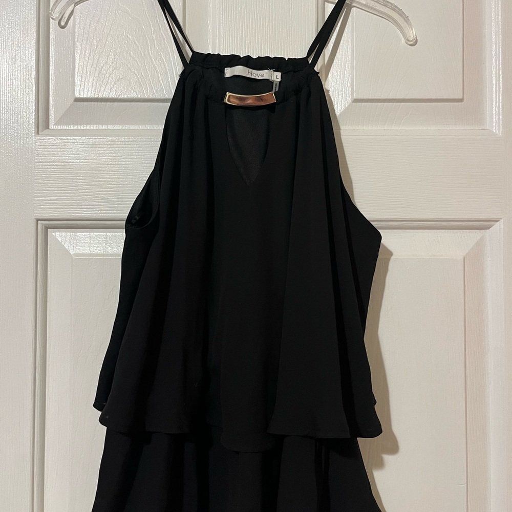 Elegant Black Sleeveless Top with Gold Accent